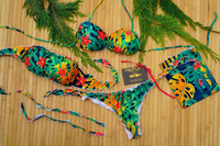 Slip bikini Jungle vista alternativa — stampa tropicale con laccetti laterali